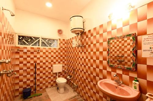 Ein Badezimmer in der Unterkunft goSTOPS Lite Varanasi