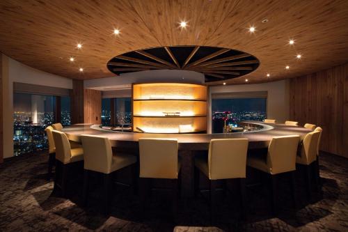 a large dining room with a large table and chairs at Cerulean Tower Tokyu Hotel, A Pan Pacific Partner Hotel in Tokyo