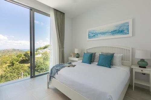 Ένα ή περισσότερα κρεβάτια σε δωμάτιο στο Sam-Kah Residence 8 Suite 2