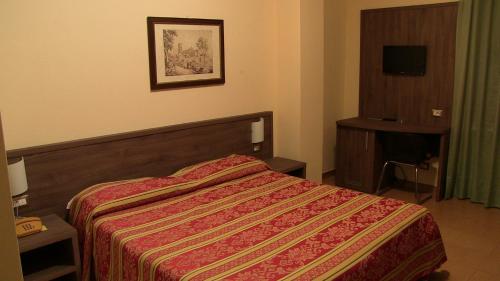 Una cama o camas en una habitación de Hotel Due Pini