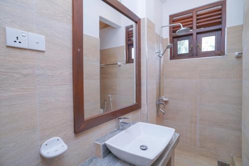 Ένα μπάνιο στο Surf Sea Breeze Apartments