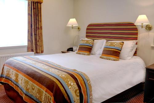 Un ou plusieurs lits dans un hébergement de l'établissement Best Western Forest and Vale Hotel