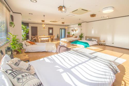 Ένα ή περισσότερα κρεβάτια σε δωμάτιο στο AMP FLAT Ogokusou