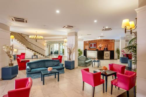 Uma área de estar em Hotel Cristoforo Colombo