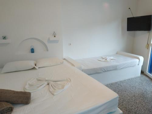 Postel nebo postele na pokoji v ubytování stamatia's rooms