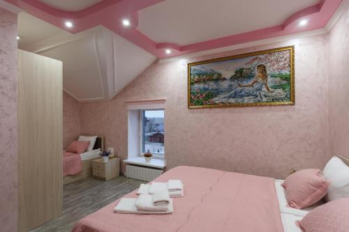 Кровать или кровати в номере Гостиничный комплекс Линь