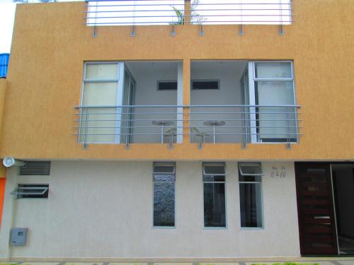 an external view of a building with a balcony at Hotel Ipanema Meridian in Neiva
