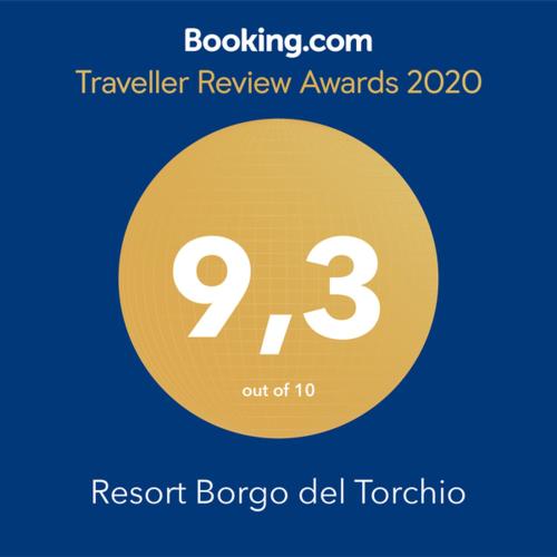 a yellow circle with the number on it at Resort Borgo del Torchio in Manerba del Garda