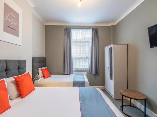 Katil atau katil-katil dalam bilik di Townhouse Apollo, Hyde Park