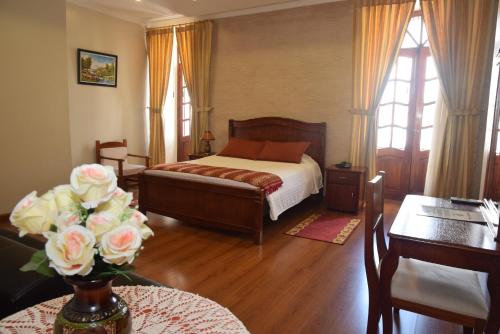 Postel nebo postele na pokoji v ubytování Hotel Casa Montero