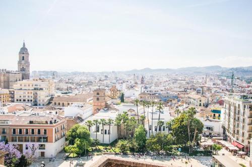 an aerial view of a city with buildings at Nordik Rooms Urban - Trinidad "Copenhague" in Málaga