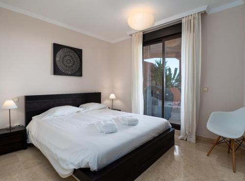 Säng eller sängar i ett rum på 2130-Amazing 2 bedrooms with terrace sea view