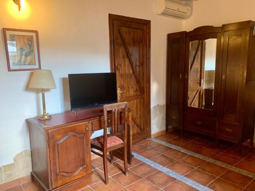 Μια τηλεόραση ή/και κέντρο ψυχαγωγίας στο Aranceto Hotel
