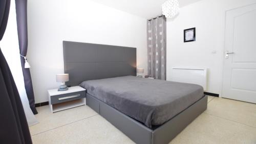 Katil atau katil-katil dalam bilik di SETTE B Locations T2-3 Residence