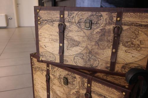 two old trunks are stacked on top of each other at Ahr Hotel Villa Alighieri in Stra