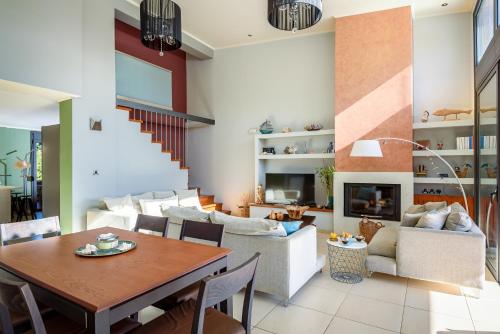 Χώρος καθιστικού στο Marathi Oasis Beach Villa