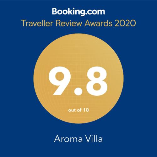 a yellow circle with the number eight and the text travel review awards at Aroma Villa Homestay in Polonnaruwa