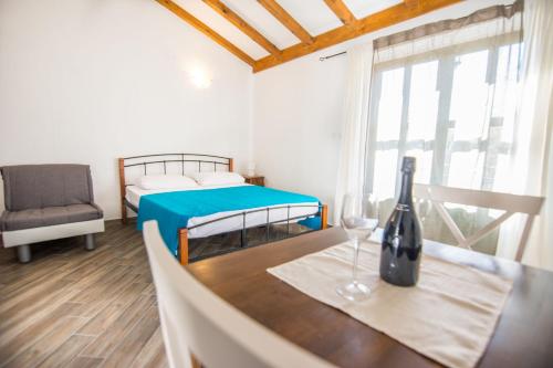 Posteľ alebo postele v izbe v ubytovaní Apartments Tarragon