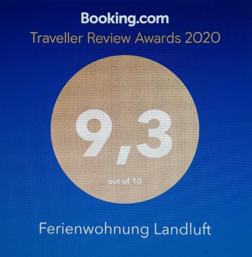 a sign with the number on a blue background at Ferienwohnung Landluft in Ostercappeln