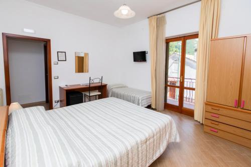 Кровать или кровати в номере Sant'Anna Bed & Breakfast
