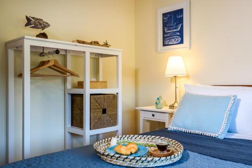 Ένα ή περισσότερα κρεβάτια σε δωμάτιο στο Marathi Oasis Beach Villa