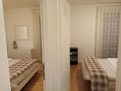 Postel nebo postele na pokoji v ubytování Terrapiana Home
