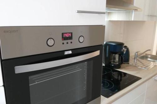 Η κουζίνα ή μικρή κουζίνα στο Apartments MUSIKVIERTEL
