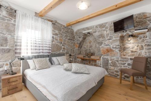 Postel nebo postele na pokoji v ubytování VILLA LAURA