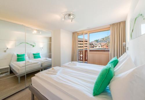 Ένα ή περισσότερα κρεβάτια σε δωμάτιο στο Chalet Belmont