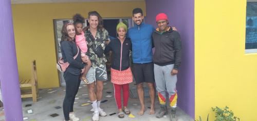 a group of people posing for a picture at Ciza e Rose in Portela