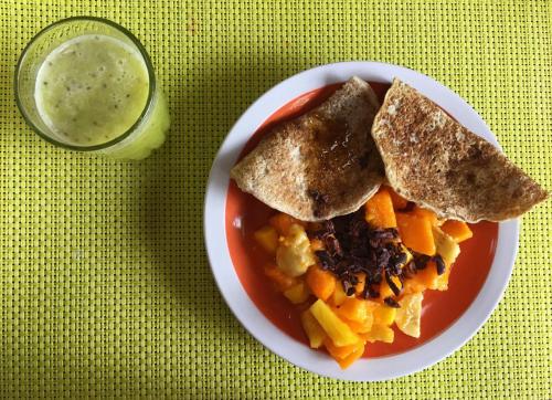 a bowl of food with toast and a jar of sauce at Chirapa Manta Amazon Lodge in Lamas