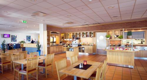 En restaurant eller et spisested på Clarion Collection Hotel Bryggeparken