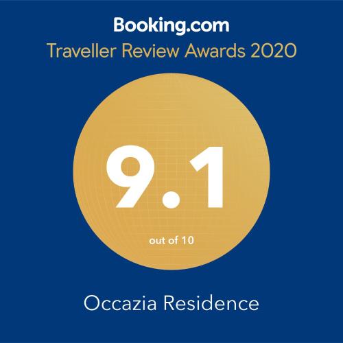 a yellow circle with the number and the text travelling review awards at Occazia Residence in Colombo