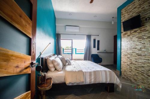 Postel nebo postele na pokoji v ubytování isel magic hotel