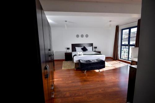 Katil atau katil-katil dalam bilik di Ankawa Hotel Boutique