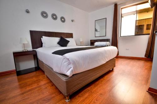 Katil atau katil-katil dalam bilik di Ankawa Hotel Boutique