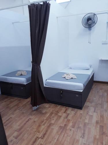 Katil atau katil-katil dalam bilik di Hana's Dorm