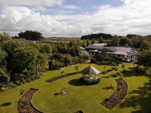 an aerial view of a garden with a gazebo at Folster Gardens Bed and Breakfast in Invercargill