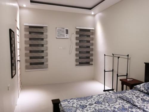 Postel nebo postele na pokoji v ubytování Sierra Casas Hotel