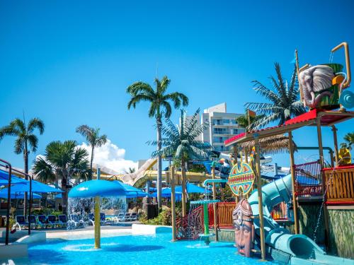 a pool at a resort with a water park at Saipan World Resort in Susupe