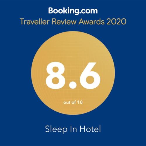a yellow circle with the number eight and sleep inigil at Sleep Inn in Hong Kong