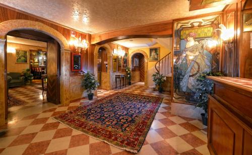 a hallway of a home with a rug on the floor at Antico Panada in Venice