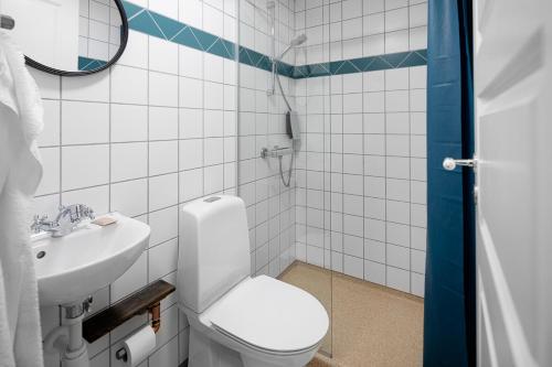 Koupelna v ubytování Hotel Sidesporet