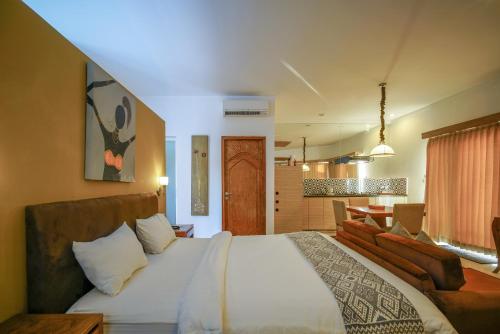 Tempat tidur dalam kamar di Ocean View Residence
