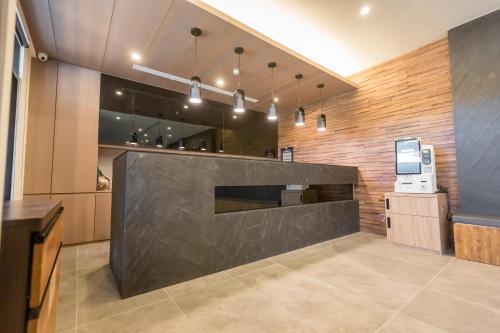 Kuchyň nebo kuchyňský kout v ubytování Traveller Inn Tiehua Cultural and Creative Hotel II