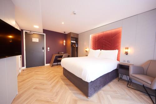 Katil atau katil-katil dalam bilik di Roomzzz York City