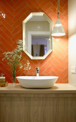 a bathroom with a white sink and a mirror at iobo apartment in Rentería