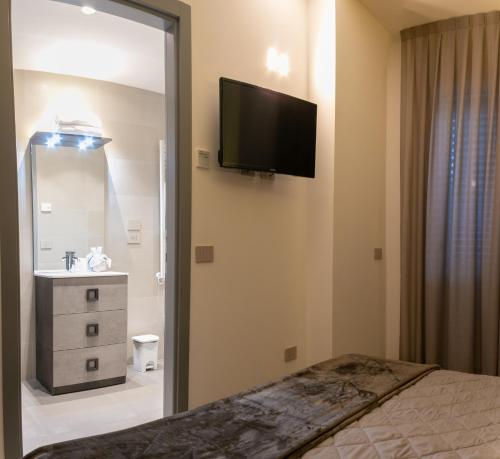 BRIGANTE SUITESにあるベッド