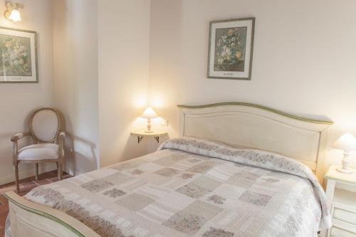 Ένα ή περισσότερα κρεβάτια σε δωμάτιο στο Agriturismo La Tesa