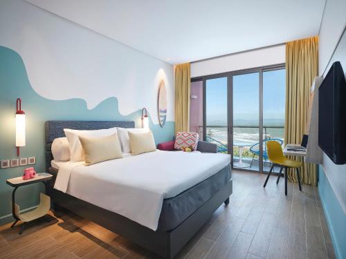 Postel nebo postele na pokoji v ubytování ibis Styles Vung Tau